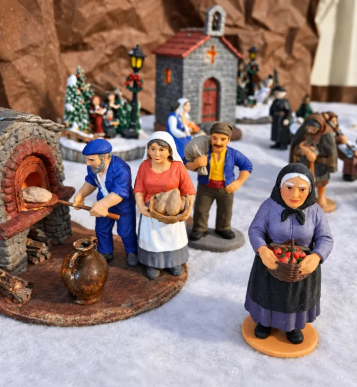 Scène de village pour crèche corse avec four à pain et santons creche-corse-scene-village-four-a-pain-santons.webp