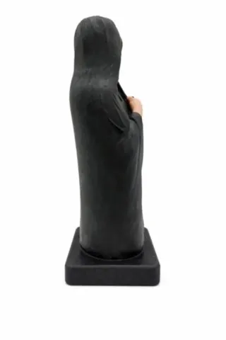 Figurine Culomba vue de profil droit figurine-corse-culomba-profil-droit.webp