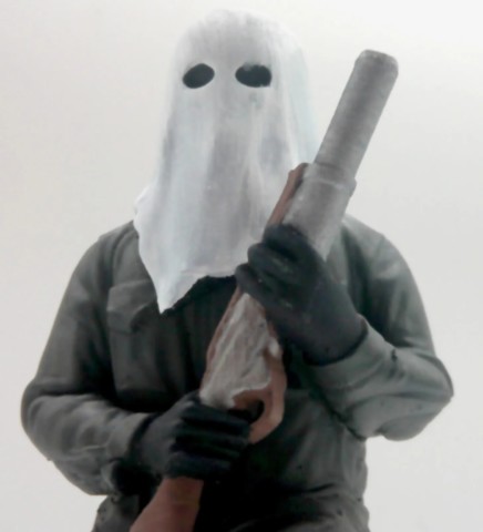 Ribellu corse à genoux gros plan