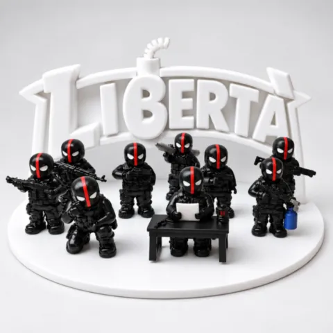 Figurines corses noires de la collection I Minò devant le mot LIBERTÀ scene-ribellu-mino-liberta.webp
