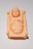 santon-corse-enfant-jesus-face-non-peint.webp